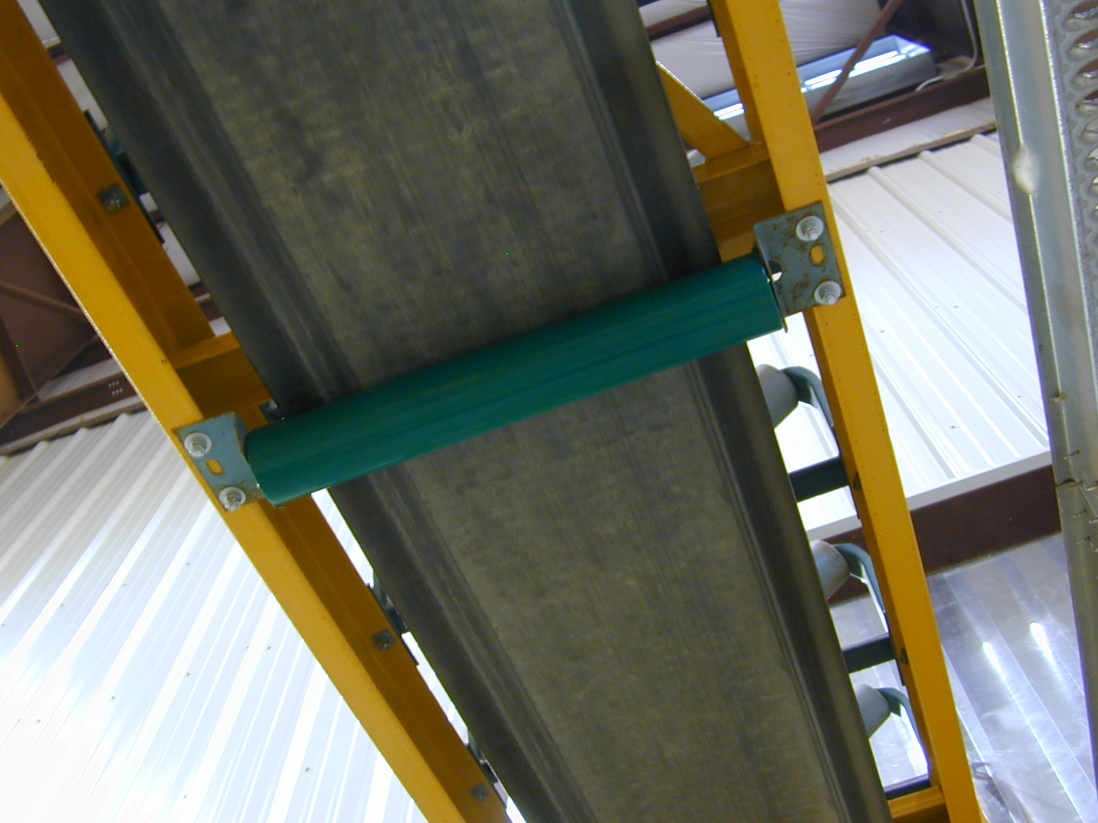 Material handling equipment lined with high-abrasion polyurea