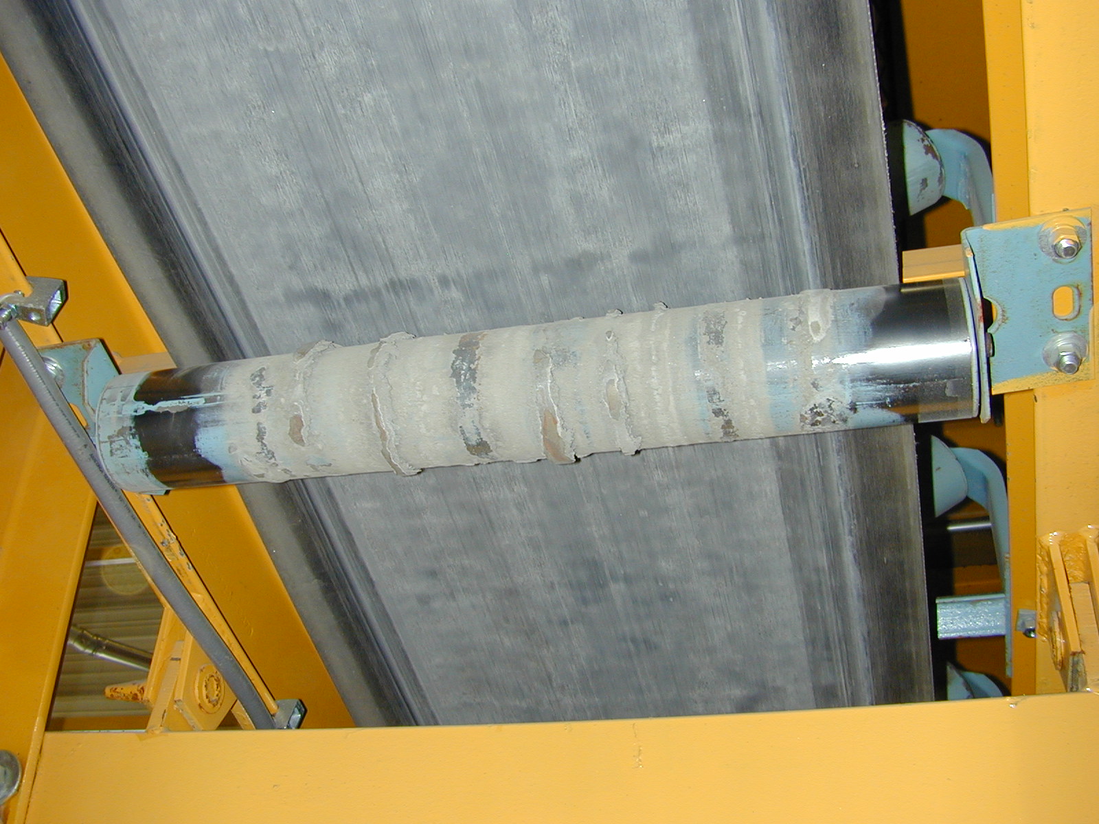 Plant maintenance coating work on corroded in-service steel